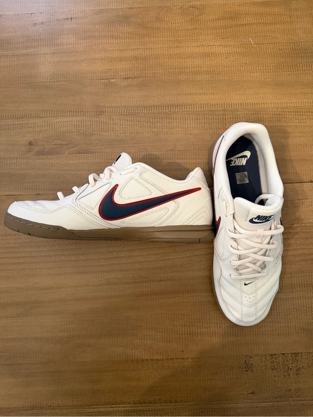Nike Men’s White Sneakers with Navy and Red Swoosh